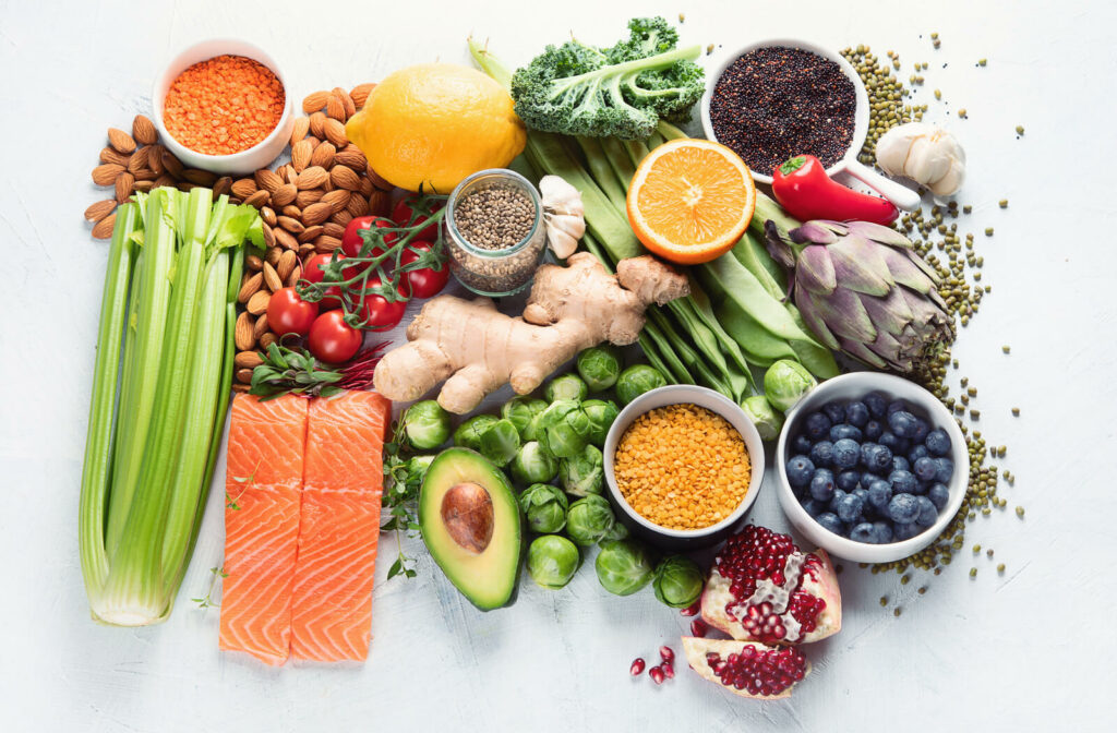 image from above of an assortment of vegetables, dried beans and rice